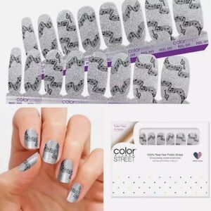 Color Street nail strips set up to new
Fa-La-La.  dripping diamonds